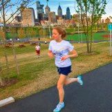 Runneres and joggers in Penn Park in Philadelphia