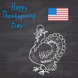 Thanksgiving day sketch doodle turkey in pilgrims hat, Freehand vector drawing and lettering on chalkboard Royalty Free Stock Images