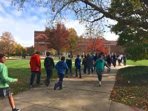 Student walking to ArcAttack Matinee at Purdue, November 2016